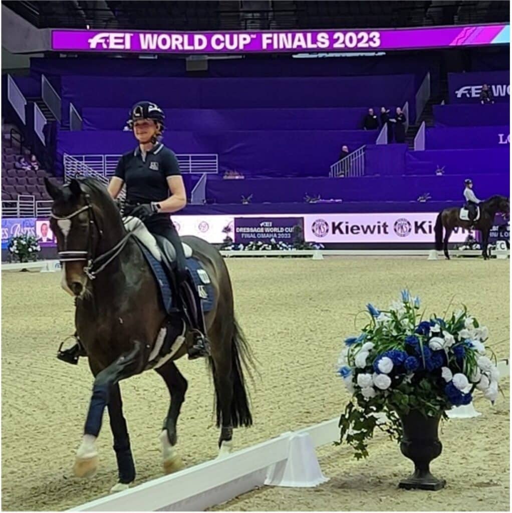 Woman riding horse for 2023 FEI World Cup Finals dressage competition in CHI Center
