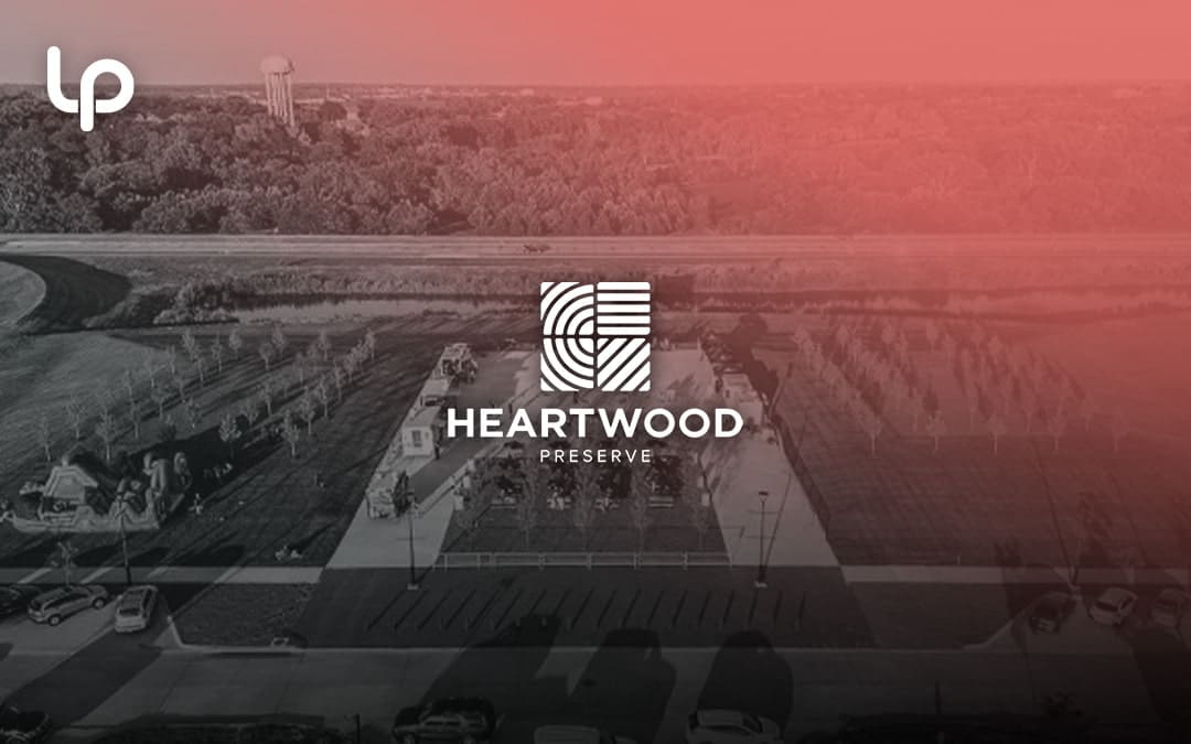Heartwood Preserve park on summer day during free community events in Omaha, including food trucks in parking lot
